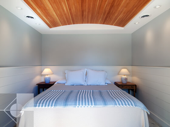 Bedroom with custom detailed ceiling.