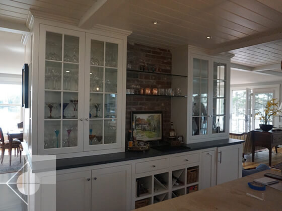 Dry bar with built in cupboards.