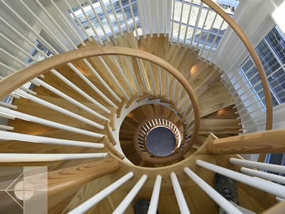 Top of spiral staircase, with no center support, looking down, designed by Phelps Architects.
