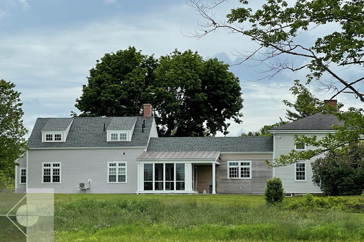 Back yard view of this historic home and barn.