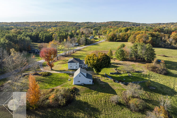 Overhead view of this Newcastle, Maine home and barn.
