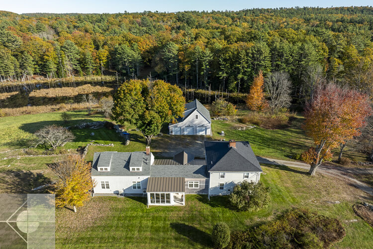 Drone image of this historic home and barn in Newcastle, Maine.