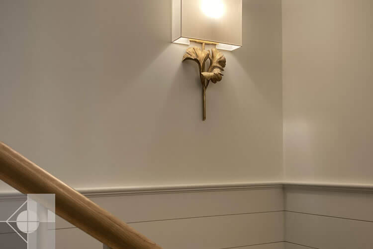 Stairwell with decorative lighting.