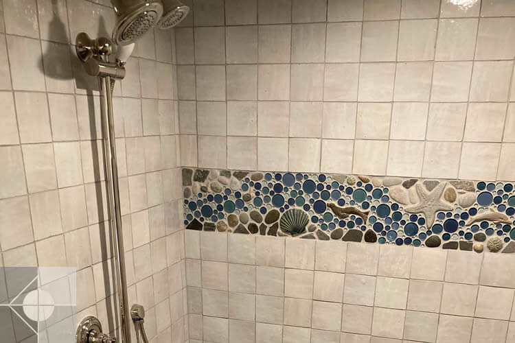 Custom tiled walk-in shower.