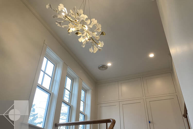 Exterior of Brooksville, Maine home looking up at all three floors.