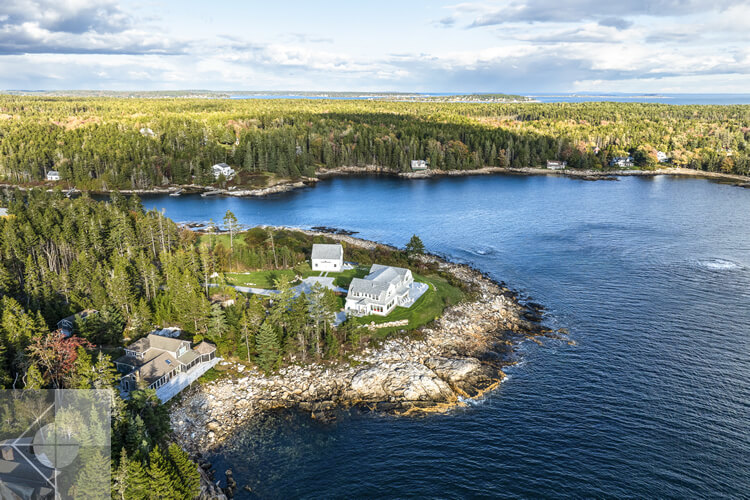 Drone photo showing the larger bay with this house on the left.