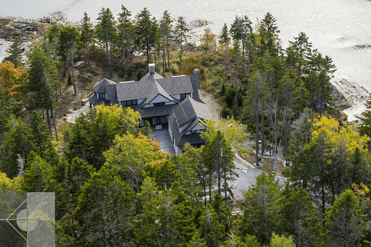 Drone image showing roofline and immediate surrounding property.
