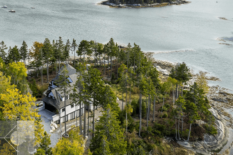 Aerial view showing this home is surrounded by the ocean on three sides.